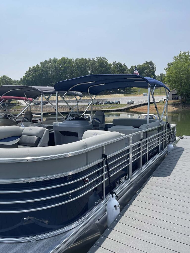 A blue pontoon boat.