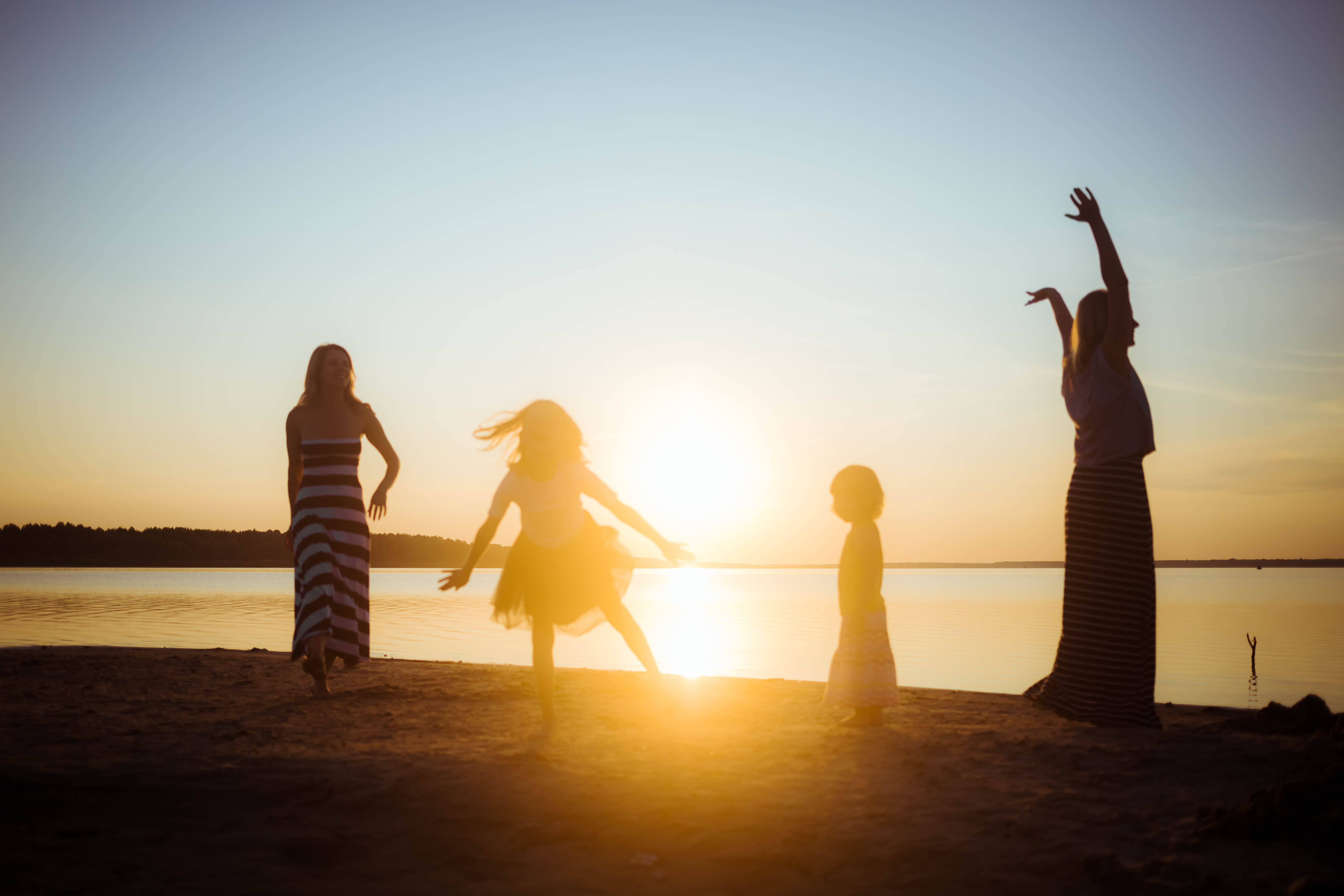 A family having fun on at a lake.